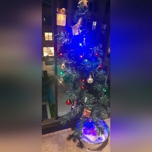 Festive Mini Christmas Tree with Multicolor Lights .Working with Solar Energy